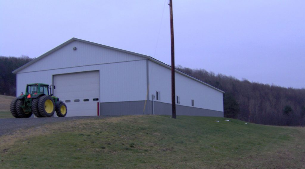 Completed white and gray barn